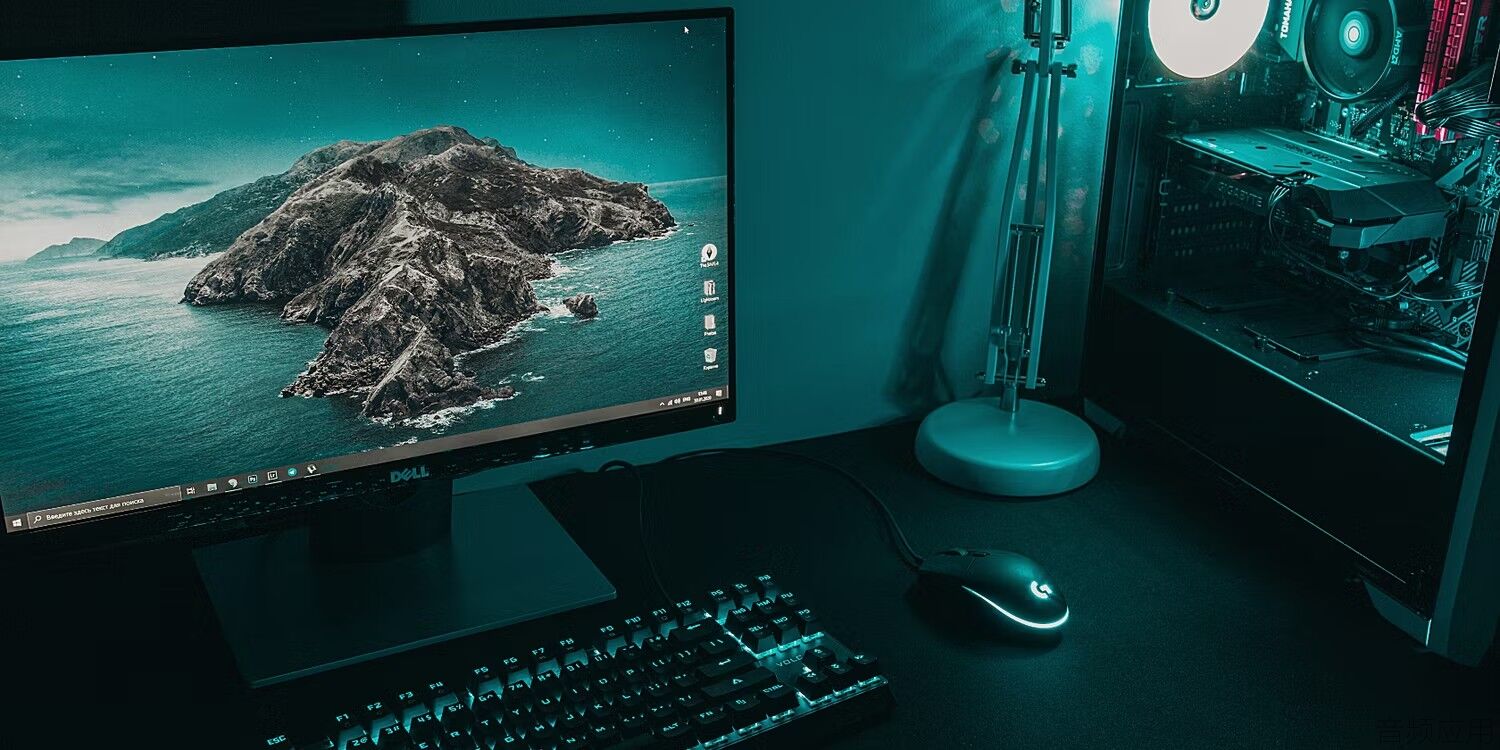 black-flat-screen-monitor-beside-a-black-cpu-on-a-black-desk.jpg_q=50&fit=crop.jpg