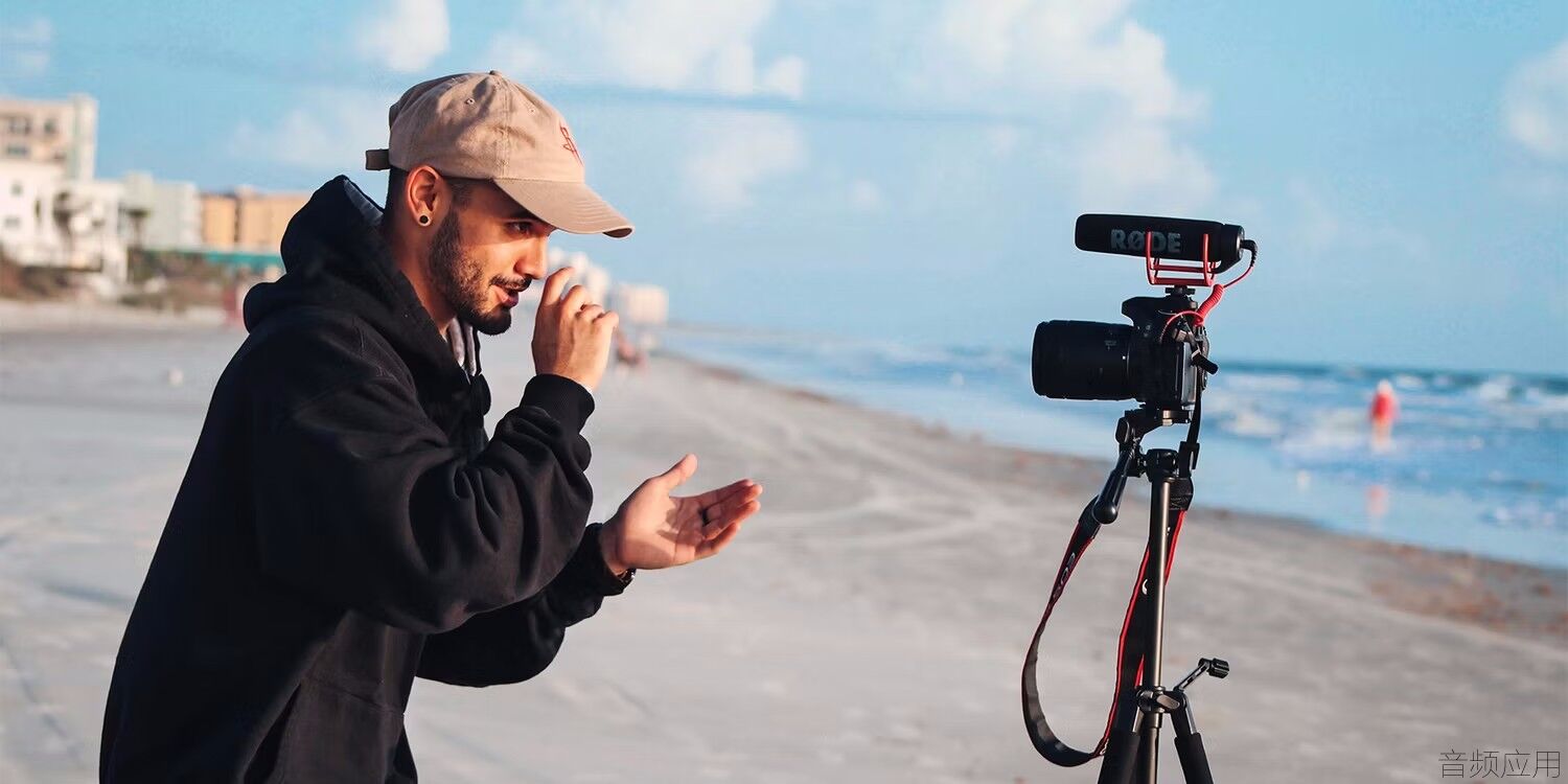 man-vlogging-on-the-beach.avif.jpg