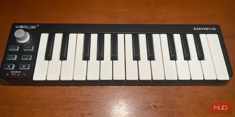 a-black-midi-controller-on-a-wooden-surface-2.jpg_q=50&fit=crop&w=1500&dpr.jpg