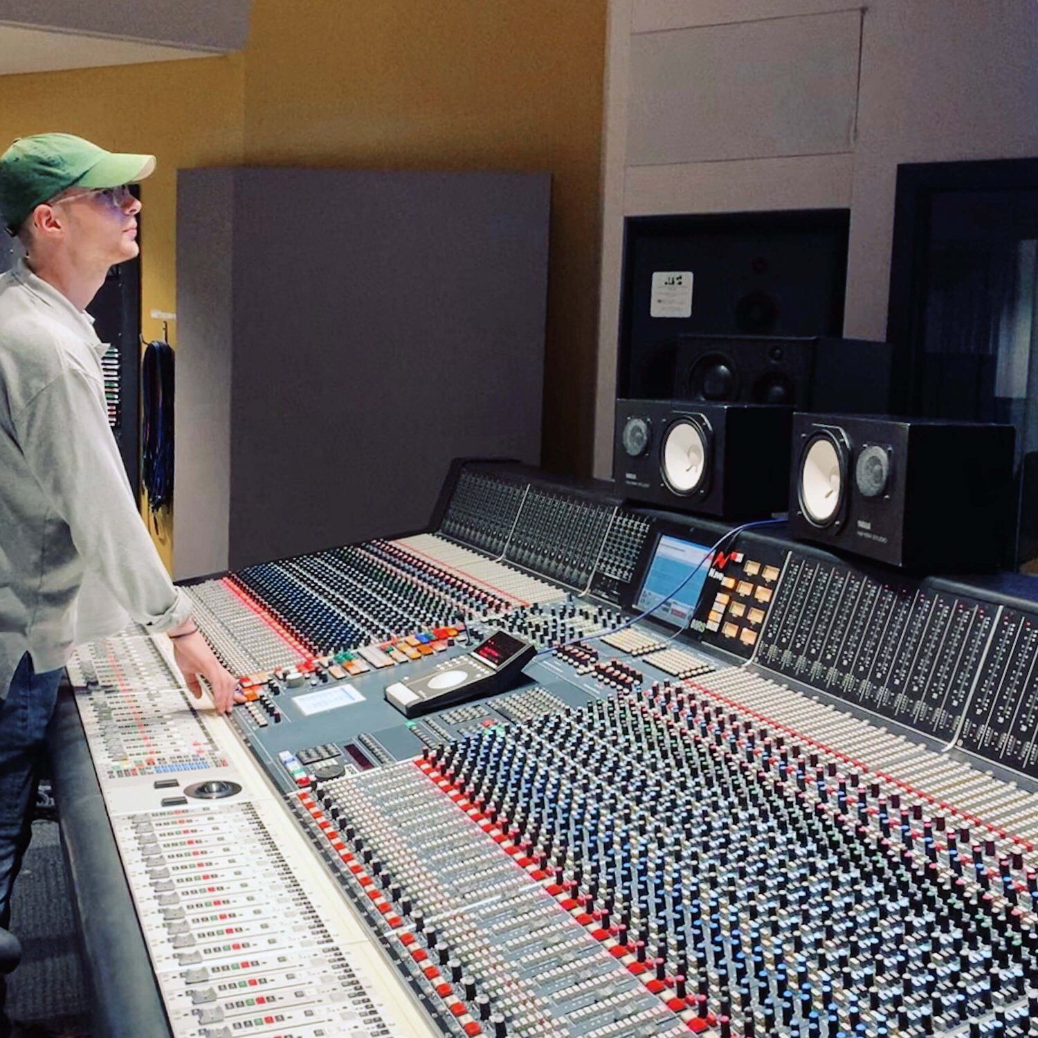 Alexander Wright at a Neve 88R recording console  large format mixing board wi.jpg